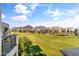 Balcony view showcasing the golf course, landscaping, and distant mountain views at 2 Biltmore Est # 313, Phoenix, AZ 85016