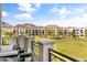 Inviting balcony view overlooking lush golf course, resort pool, and Camelback Mountain backdrop, perfect for relaxing outdoors at 2 Biltmore Est # 313, Phoenix, AZ 85016