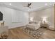 Cozy bedroom with hardwood floors, plush bedding, and ambient lighting at 2 Biltmore Est # 313, Phoenix, AZ 85016