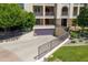 Private garage entrance highlighted by stone accents and wrought iron fencing, offering secure and stylish parking at 2 Biltmore Est # 313, Phoenix, AZ 85016