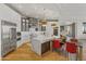 Gourmet kitchen with stainless steel appliances, marble countertops, and custom cabinetry, ideal for culinary enthusiasts at 2 Biltmore Est # 313, Phoenix, AZ 85016