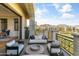 Relaxing patio with comfortable seating area and scenic golf course views at 2 Biltmore Est # 313, Phoenix, AZ 85016