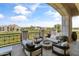 Inviting patio with comfortable seating area and scenic views of the golf course at 2 Biltmore Est # 313, Phoenix, AZ 85016