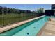 Community pool featuring cool, refreshing water, surrounded by lush landscaping and meticulously maintained grounds at 2 Biltmore Est # 313, Phoenix, AZ 85016
