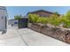 View of backyard, highlighting the privacy and modern landscaping surrounding the property at 2033 E Hillery Dr, Phoenix, AZ 85022