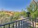 Exterior view from balcony of desert landscape and neighboring buildings at 20704 N 90Th Pl # 1015, Scottsdale, AZ 85255