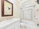 Bright bathroom with white tile and decorative accents at 20704 N 90Th Pl # 1015, Scottsdale, AZ 85255