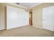 Bedroom features a built-in wardrobe and neutral carpeting at 20704 N 90Th Pl # 1015, Scottsdale, AZ 85255