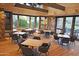 Conference room with views of the outdoors, tables and chairs on wood floors with stone accents at 20704 N 90Th Pl # 1015, Scottsdale, AZ 85255