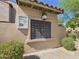 Exterior shot of community mailboxes with lantern, information board, and desert landscaping at 20704 N 90Th Pl # 1015, Scottsdale, AZ 85255