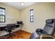 Office with built in desk, natural light, and a comfortable place to relax at 20704 N 90Th Pl # 1015, Scottsdale, AZ 85255