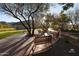 Scenic outdoor seating area on a well-maintained green space, perfect for relaxation at 20704 N 90Th Pl # 1015, Scottsdale, AZ 85255