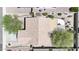 Aerial view showcases the home's tile roof, patio cover, desert landscaping and proximity to neighboring houses at 20739 N 106Th Ln, Peoria, AZ 85382