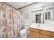 Well-maintained bathroom with a vanity and shower-tub combination at 20739 N 106Th Ln, Peoria, AZ 85382