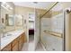 Bright bathroom with double shower and door to main bedroom at 20739 N 106Th Ln, Peoria, AZ 85382