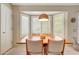 Cozy dining area bathed in natural light from the bay window at 20739 N 106Th Ln, Peoria, AZ 85382