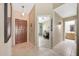 Inviting home entryway with tile flooring and views to the office and bathroom areas at 20739 N 106Th Ln, Peoria, AZ 85382
