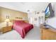Comfortable main bedroom featuring a ceiling fan and neutral carpeting at 20739 N 106Th Ln, Peoria, AZ 85382