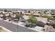 An aerial street view displays the home's landscaping, and proximity to neighboring properties in the community at 20739 N 106Th Ln, Peoria, AZ 85382