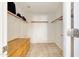 Walk-in closet with built-in shelves and drawers for ample storage at 20739 N 106Th Ln, Peoria, AZ 85382