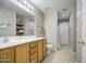 Bathroom showcasing a vanity, tile flooring, toilet and shower at 22333 E Calle De Flores St, Queen Creek, AZ 85142