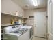 Functional laundry room equipped with a washer and dryer at 22333 E Calle De Flores St, Queen Creek, AZ 85142
