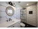 Modern bathroom with black and white hexagon tile and new fixtures at 228 E Del Rio Dr, Tempe, AZ 85282