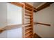 Custom closet with built in shelving and hanging rods at 228 E Del Rio Dr, Tempe, AZ 85282