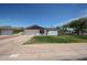 Attractive single-story home features a fresh exterior paint job, attached garage, and well-kept front yard at 228 E Del Rio Dr, Tempe, AZ 85282