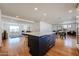 Bright, open kitchen featuring an island, new appliances, and seamless flow to the living spaces at 228 E Del Rio Dr, Tempe, AZ 85282