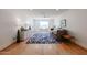 Spacious living room featuring hardwood floors, ample natural light, and a comfortable seating area at 228 E Del Rio Dr, Tempe, AZ 85282