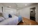 Bright bedroom with light wood floors, closet and bathroom access at 228 E Del Rio Dr, Tempe, AZ 85282