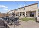 A well-designed backyard featuring a pool, patio, grassy area, and string lights at 22812 N 123Rd Dr, Sun City West, AZ 85375