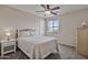 This charming bedroom has a cozy atmosphere with a ceiling fan and carpeted floors at 22812 N 123Rd Dr, Sun City West, AZ 85375