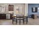 Casual dining area features wood floors and a view from the window at 22812 N 123Rd Dr, Sun City West, AZ 85375