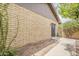 Enclosed backyard with block wall, sliding door access, and space for outdoor relaxation at 2515 S Maple Ave # 103, Tempe, AZ 85282