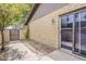 Private backyard with block wall, sliding glass door access, and potential for landscaping at 2515 S Maple Ave # 103, Tempe, AZ 85282