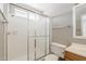 Cozy bathroom with a shower, sliding glass doors, and light wood vanity at 2515 S Maple Ave # 103, Tempe, AZ 85282