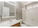 Bathroom featuring a combined shower and tub with a light wood vanity at 2515 S Maple Ave # 103, Tempe, AZ 85282