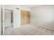 Bedroom featuring carpet, closet and access to other parts of the home at 2515 S Maple Ave # 103, Tempe, AZ 85282