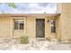 Charming brick home featuring a secure black metal front door and well-maintained front yard at 2515 S Maple Ave # 103, Tempe, AZ 85282