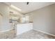 Bright eat-in kitchen with appliances and a breakfast bar at 2515 S Maple Ave # 103, Tempe, AZ 85282