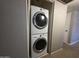Laundry area features stacked washer and dryer at 2515 S Maple Ave # 103, Tempe, AZ 85282