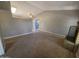 Living room with carpet, fireplace, sliding glass doors, and open floor plan at 2515 S Maple Ave # 103, Tempe, AZ 85282