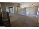 View of open living room and kitchen area, including fireplace, and closet space at 2515 S Maple Ave # 103, Tempe, AZ 85282
