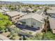 Home's backyard with covered patio, complemented by desert landscaping in a suburban setting at 2629 E Verbena Dr, Phoenix, AZ 85048