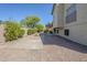 Expansive backyard featuring gravel landscaping; a perfect canvas for creating your outdoor oasis at 2629 E Verbena Dr, Phoenix, AZ 85048