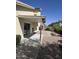 Backyard showcasing covered patio and landscaped garden at 2629 E Verbena Dr, Phoenix, AZ 85048
