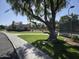 A beautiful community view showcases the sparkling pool, lush landscaping, and attractive architecture at 2629 E Verbena Dr, Phoenix, AZ 85048