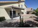 Exterior view of home featuring a covered patio and low-maintenance yard at 2629 E Verbena Dr, Phoenix, AZ 85048